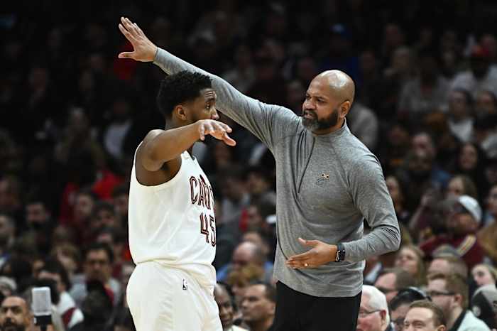 Feb 11, 2023; Cleveland, Ohio, USA; Cleveland Cavaliers head coach J.B. Bickerstaff talks to guard Donovan Mitchell (45) during the second half against the Chicago Bulls at Rocket Mortgage FieldHouse. Mandatory Credit: Ken Blaze-USA TODAY Sports